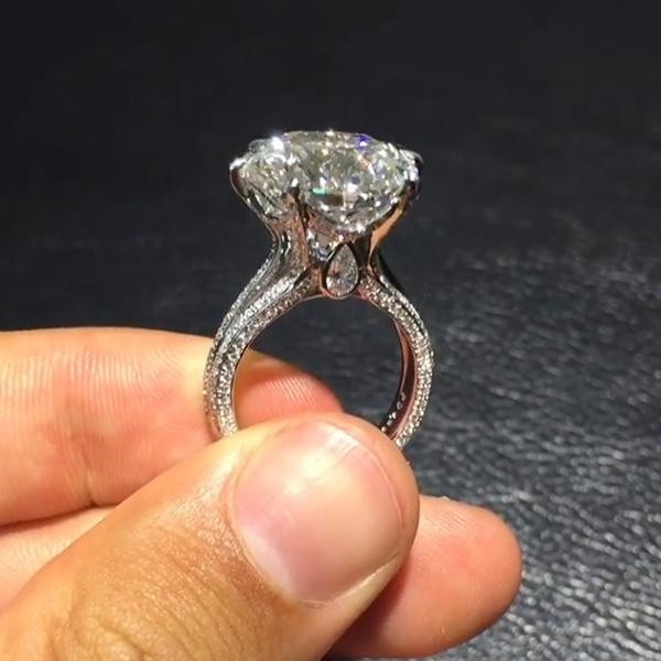 Round cut white clearance sapphire engagement rings