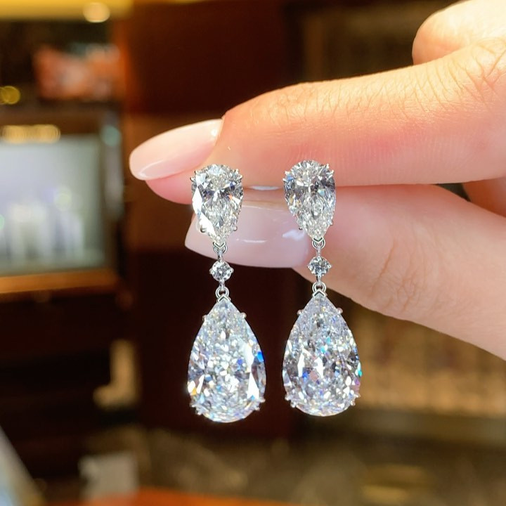 Pear Cut White Sapphire Drop Earrings in Sterling Silver