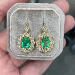 Vintage Style Oval Cut Emerald Drop Earrings in Gold