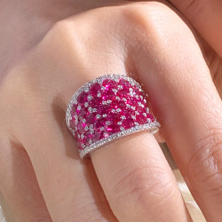 25.5ctw Oval Shaped Ruby Saddle Ring with Diamond Prongs
