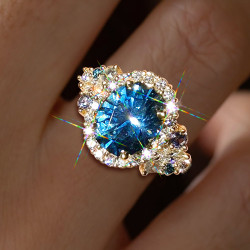 5ct Oval Cut Blue Sapphire Cluster Halo Ring