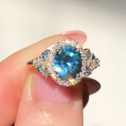 5ct Oval Cut Blue Sapphire Cluster Halo Ring