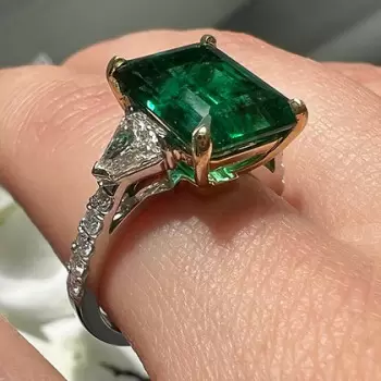 8ct Emerald Cut Emerald Three Stone Engagement Ring