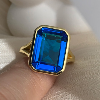 8.5ct Emerald Cut Blue Topaz Split Shank Engagement Ring