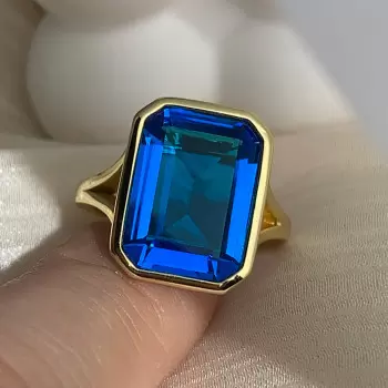 8.5ct Emerald Cut Blue Topaz Split Shank Engagement Ring