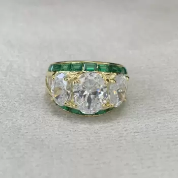 Three-stone Oval Cut White Sapphire Ring in Gold