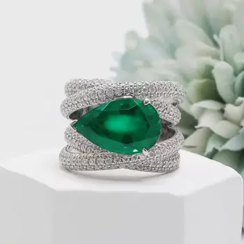 5.7ct East-West Pear Cut Emerald Paved Cocktail Ring