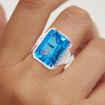 14ct Emerald Cut Blue Topaz Halo Cocktail Ring
