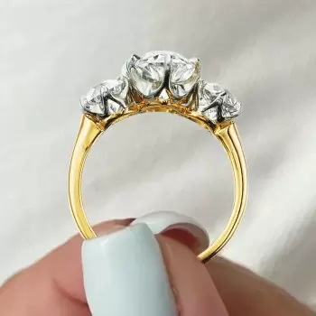 7ctw Pear Cut Two Tone Vintage Three Stone Engagement Ring