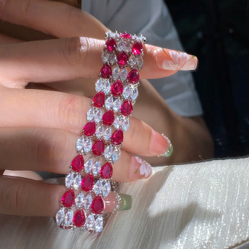 36ctw White Sapphire and Three Row Ruby Bracelet