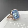 8.4ct Emerald Cut Aquamarine Halo Engagement Ring