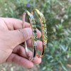 Simple Round Cut Emerald Bangle in Gold
