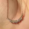 Round Cut White Sapphire Crown Necklace in Gold