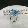 8.4ct Radiant Cut Aquamarine Three-stone Engagement Ring