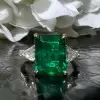 8ct Emerald Cut Emerald Three Stone Engagement Ring