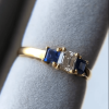 3ctw Emerald Cut Three Stone White & Blue Sapphire Engagement Ring in Gold