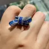 Invisible Set Baguette Cut Ruby Bow Ring