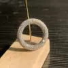 Paved White Sapphire Twist Wedding Band