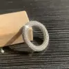 Paved White Sapphire Twist Wedding Band