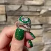 2ct Round Cut White Sapphire Ring with a Emerald Calibre Halo