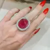 8.2ct Cushion Cut Ruby Paved Halo Cocktail Ring