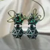 24ctw Hexagon-shaped Emerald Drop Earrings in Black Gold