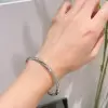 6ctw White Sapphire Paved Twist Mobius Bangle