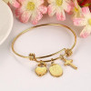 Gold Tone Charm Bracelet in Stainless Steel