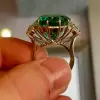 5.8ct Oval Cut Emerald Three-Stone Engagement Ring