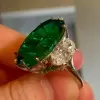 5.8ct Oval Cut Emerald Three-Stone Engagement Ring
