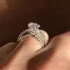 Round Cut Criss Cross Engagement Ring