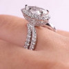 Halo Pear Cut White Sapphire Twist Engagement Ring