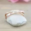 Fashion Criss Cross Baguette & Round Diamond Anniversary Band in Rose Gold Tone