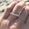 Fashion Criss Cross Baguette & Round Diamond Anniversary Band in Rose Gold Tone
