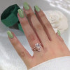 Unique Rose Gold Tone Oval Cut White Sapphire Ring with Curved Eternity Band