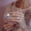 Three-stone Oval Cut Ring With A Radiant Cut Eternity Ring Band