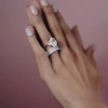 Three-stone Oval Cut Ring With A Radiant Cut Eternity Ring Band