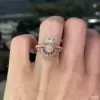 4ct Oval Cut White Sapphire 2pcs Bridal Set in Rose Gold