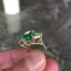Three-stone Emerald Engagement Ring