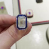 Sapphire Calibre Halo Emerald Cut Engagement Ring