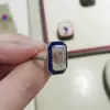 Sapphire Calibre Halo Emerald Cut Engagement Ring