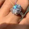 4ct Halo Oval Cut White Sapphire Engagement Ring