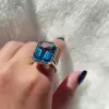 8.5ct Emerald Cut Blue Topaz Split Shank Engagement Ring