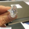 8ct Oval Cut Three-stone Halo Engagement Ring