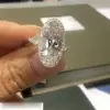 8ct Oval Cut Three-stone Halo Engagement Ring