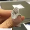 8ct Oval Cut Three-stone Halo Engagement Ring