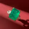 12ct Emerald Cut Emerald Three Stone Engagement Ring