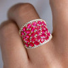 25.5ctw Oval Shaped Ruby Saddle Ring with Diamond Prongs