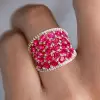 25.5ctw Oval Shaped Ruby Saddle Ring with Diamond Prongs