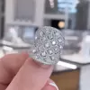 12CTW Round Cut White Sapphire Wedding Band